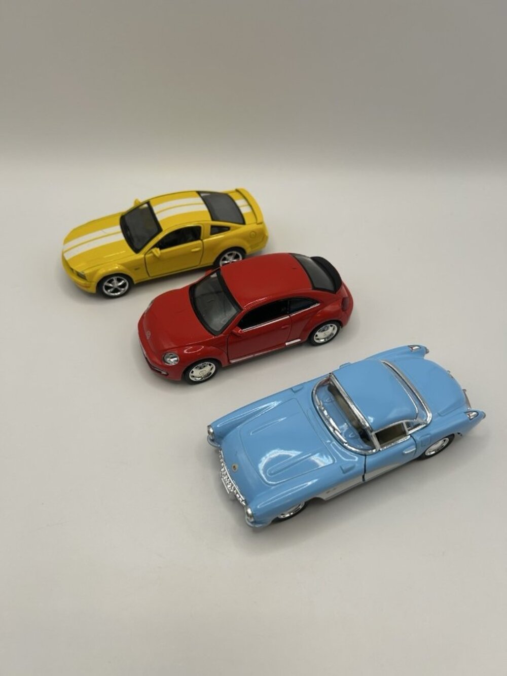Lot of 3 Diecast Cars Corvette VW Beetle Mustang Kinsmart Scale Blue Red Yellow